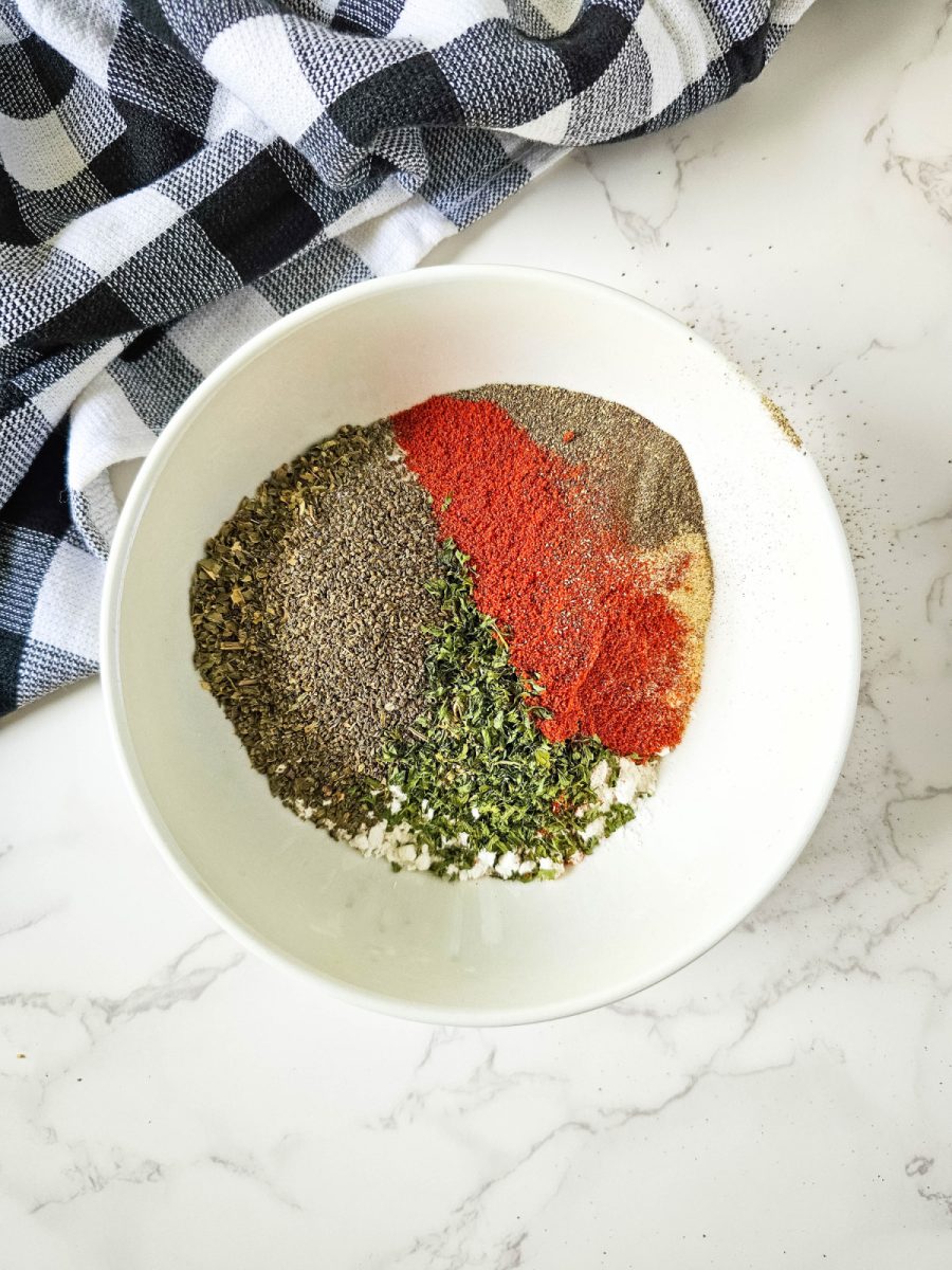 spices and herbs in white bowl