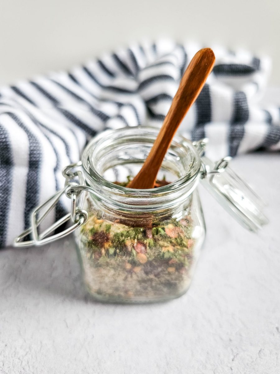 spoon inside mason jar with spices