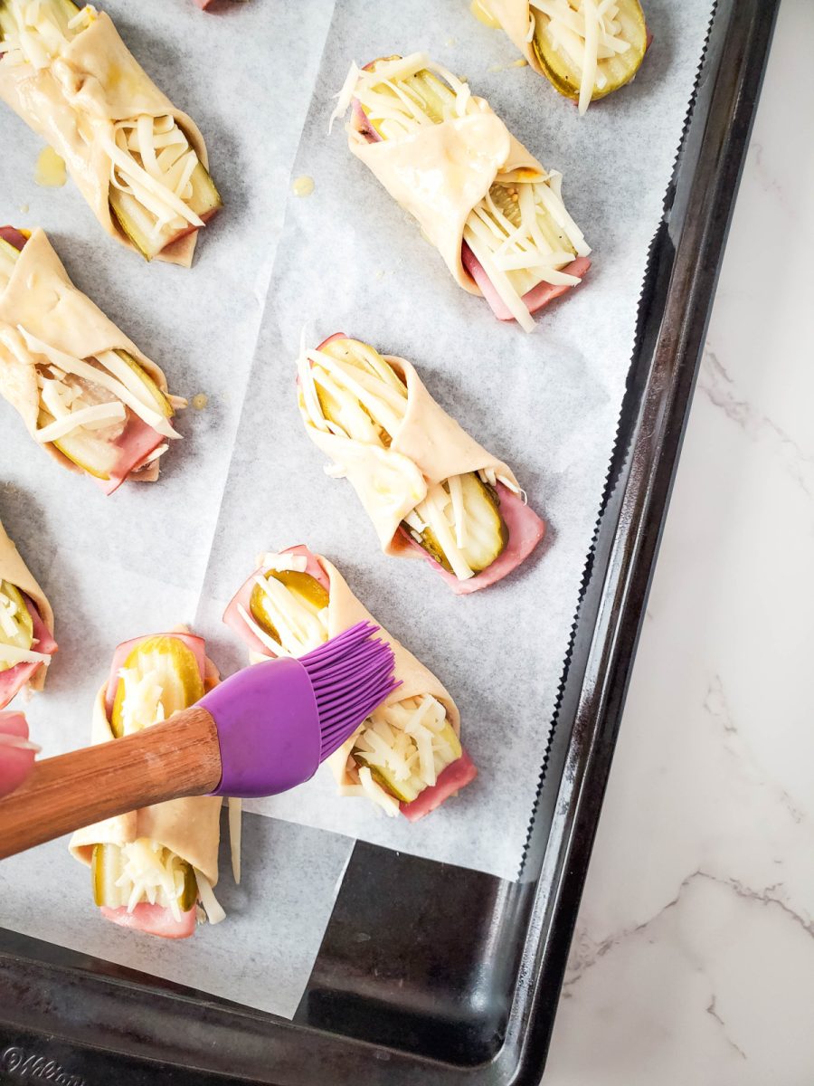 brush each puff with egg wash and bake