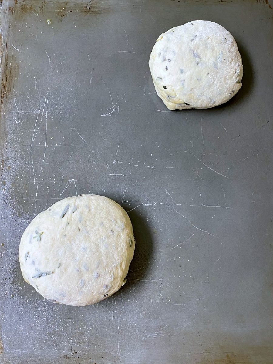 bread dough on pan after first rise