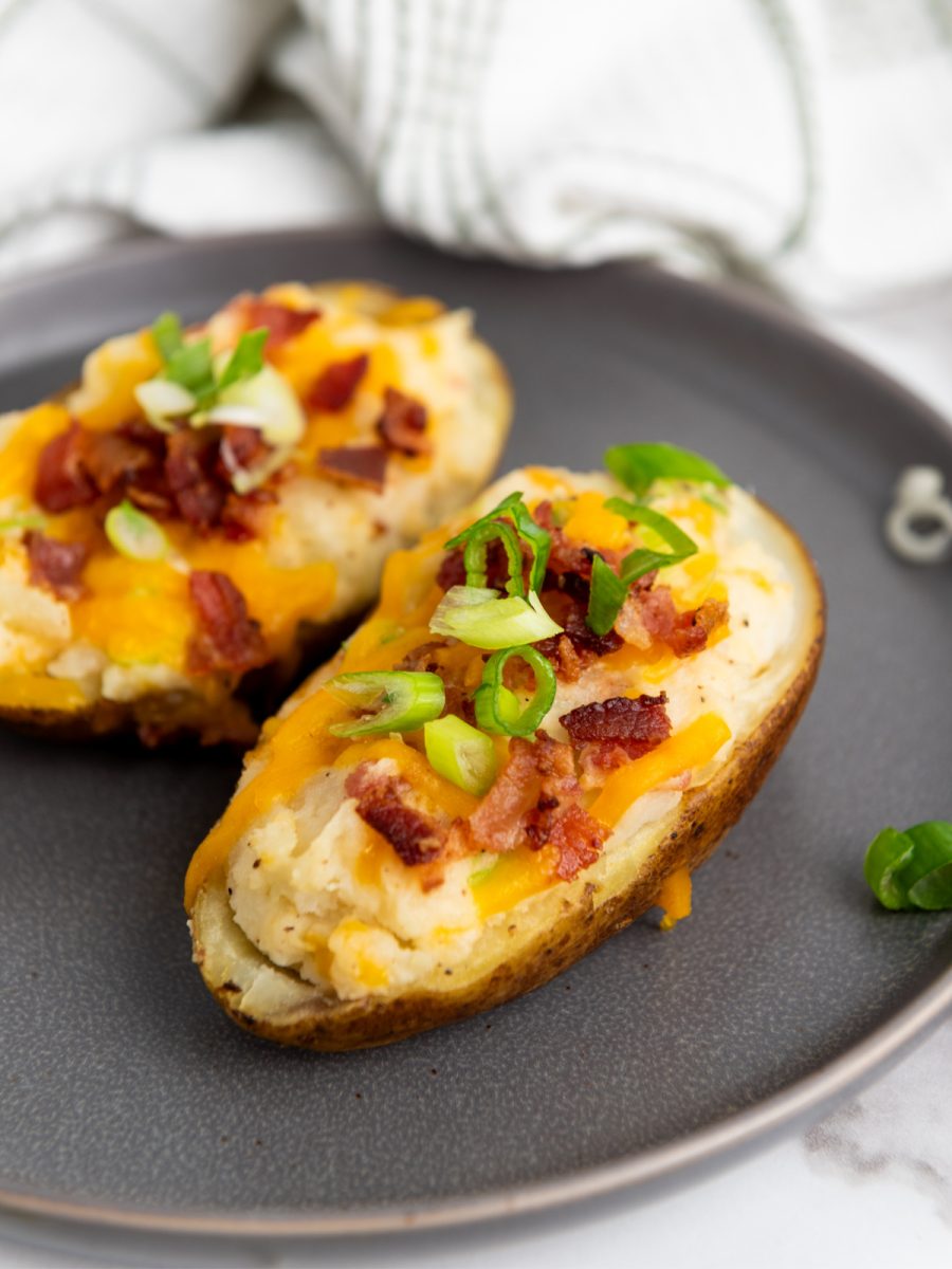 close up of cheese and bacn stuffed potato