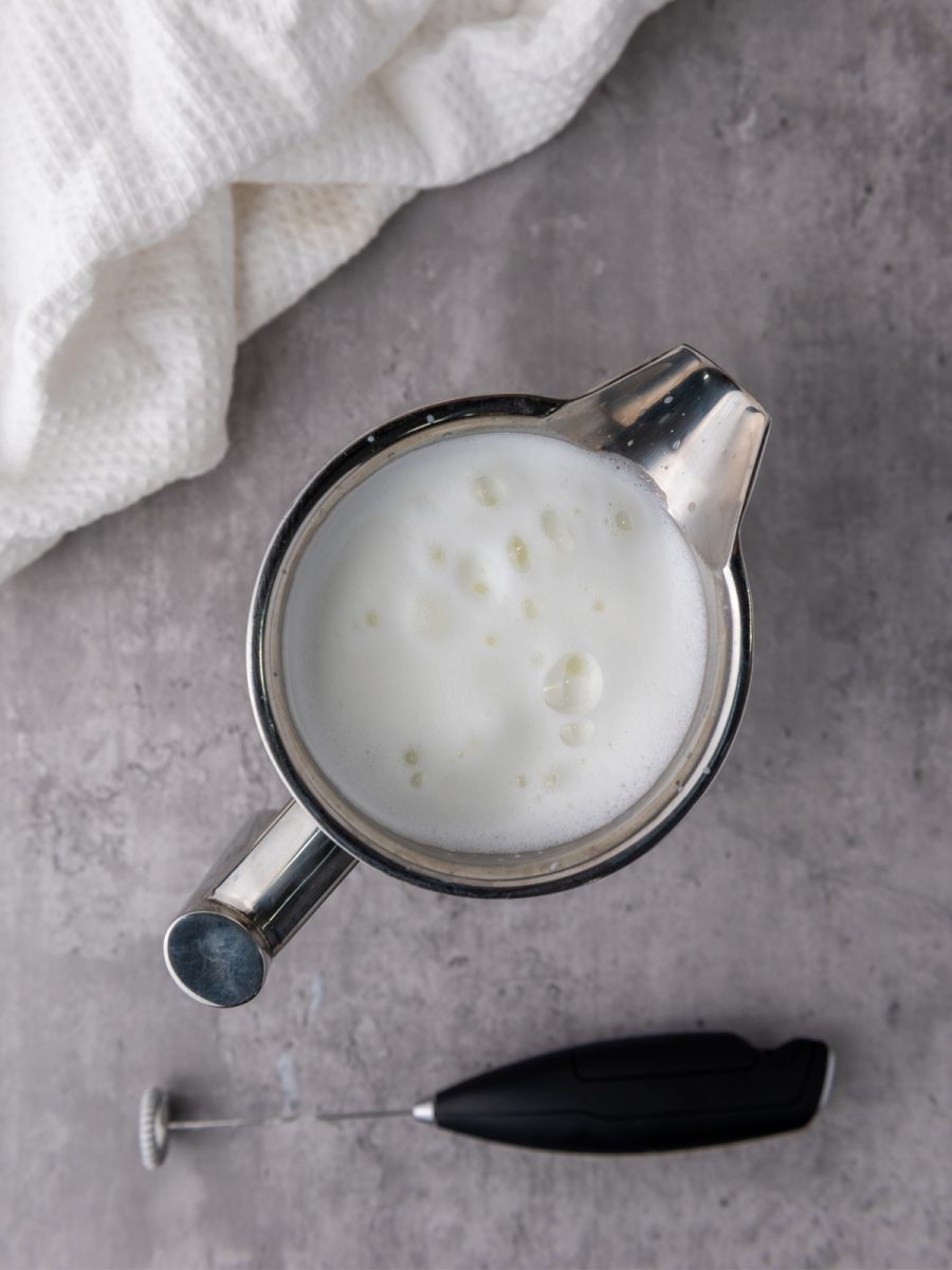 froth milk in container