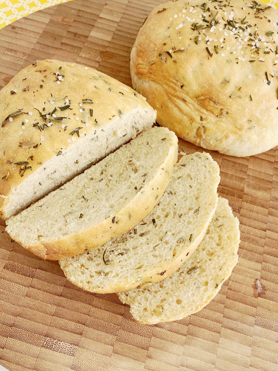 loaf of bread sliced on board