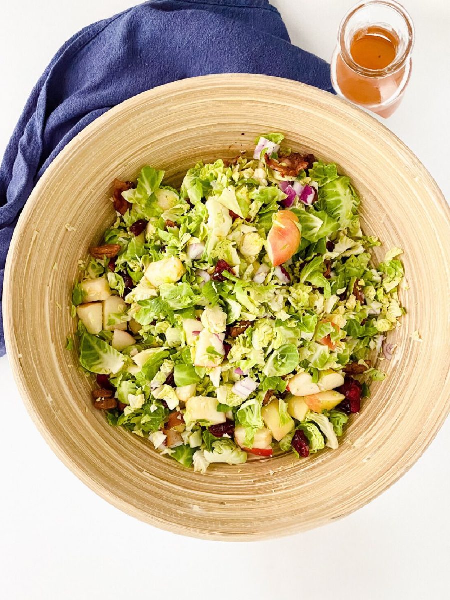 overhead view of salad with vegetables and fruit