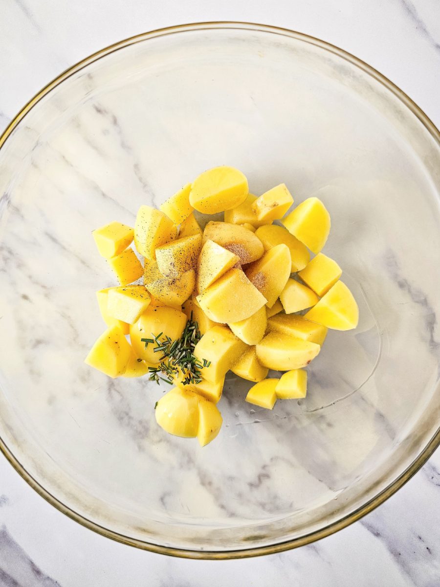 potatoes and seasonings in bowl