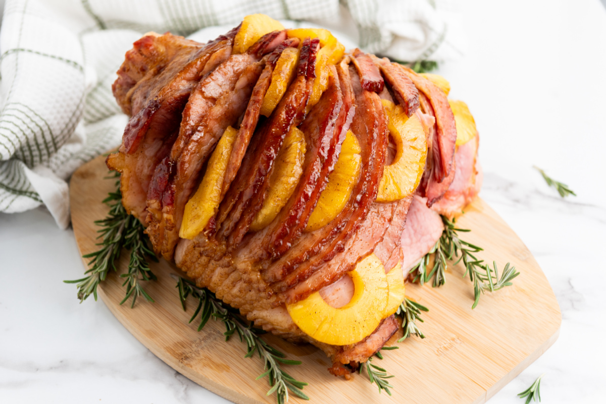 holiday pineapple ham on wood tray