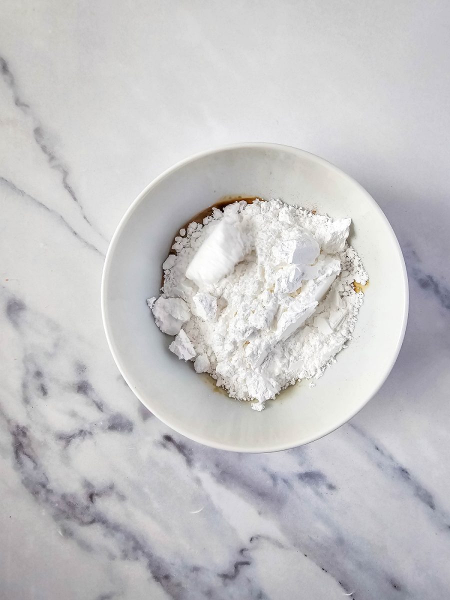 add powdered sugar to espresso in bowl