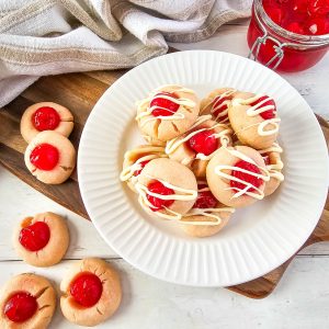 A plate of freshly baked Cherry Almond Shortbread Cookies, each one a perfect bite-sized treat.