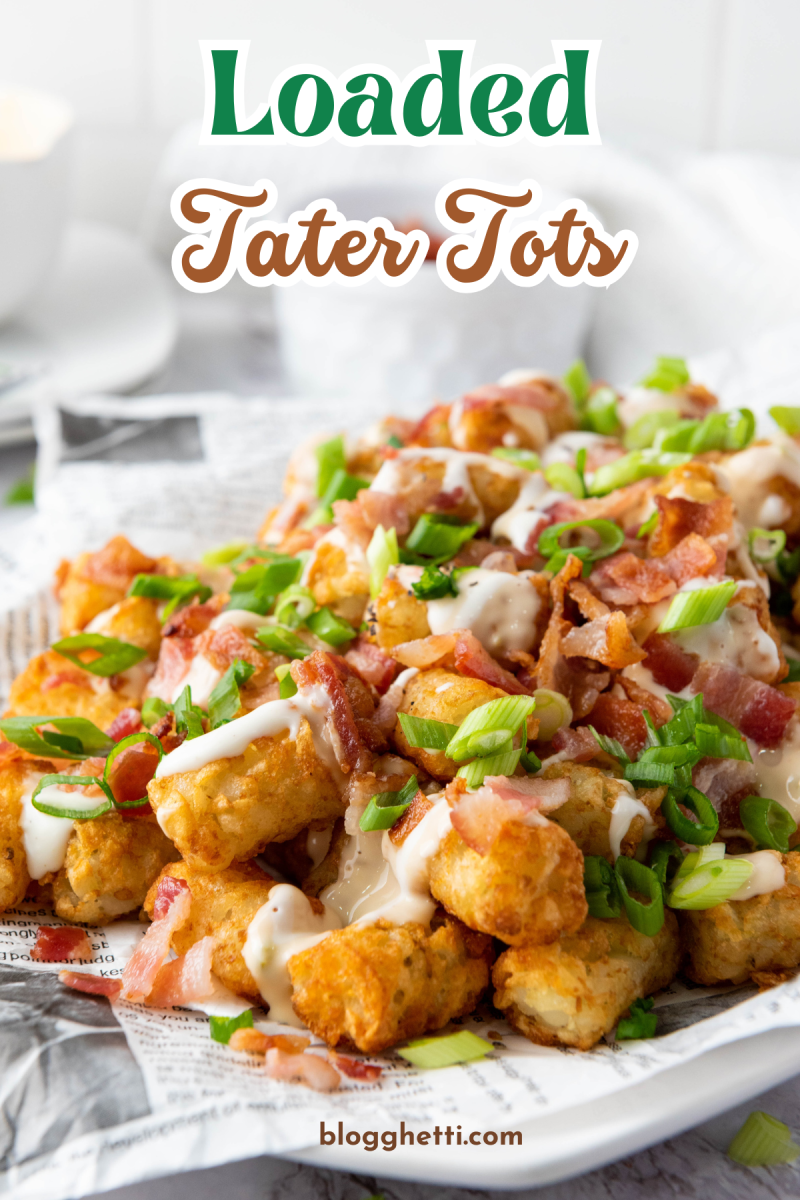 Plate of crispy loaded tater tots topped with melted cheese, bacon bits, green onions, and drizzled with ranch dressing. The text 'Loaded Tater Tots' at the top