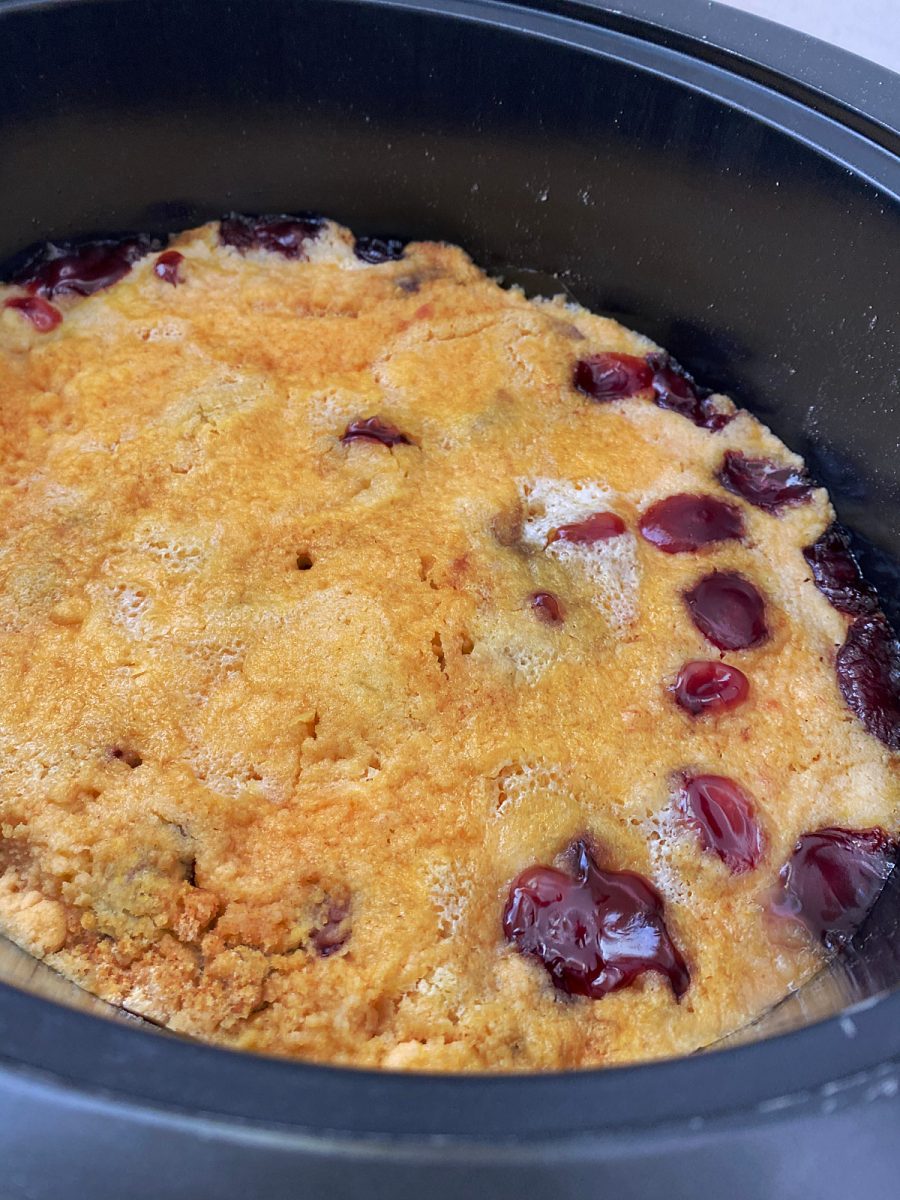 cherry cobbler overhead view in crock pot