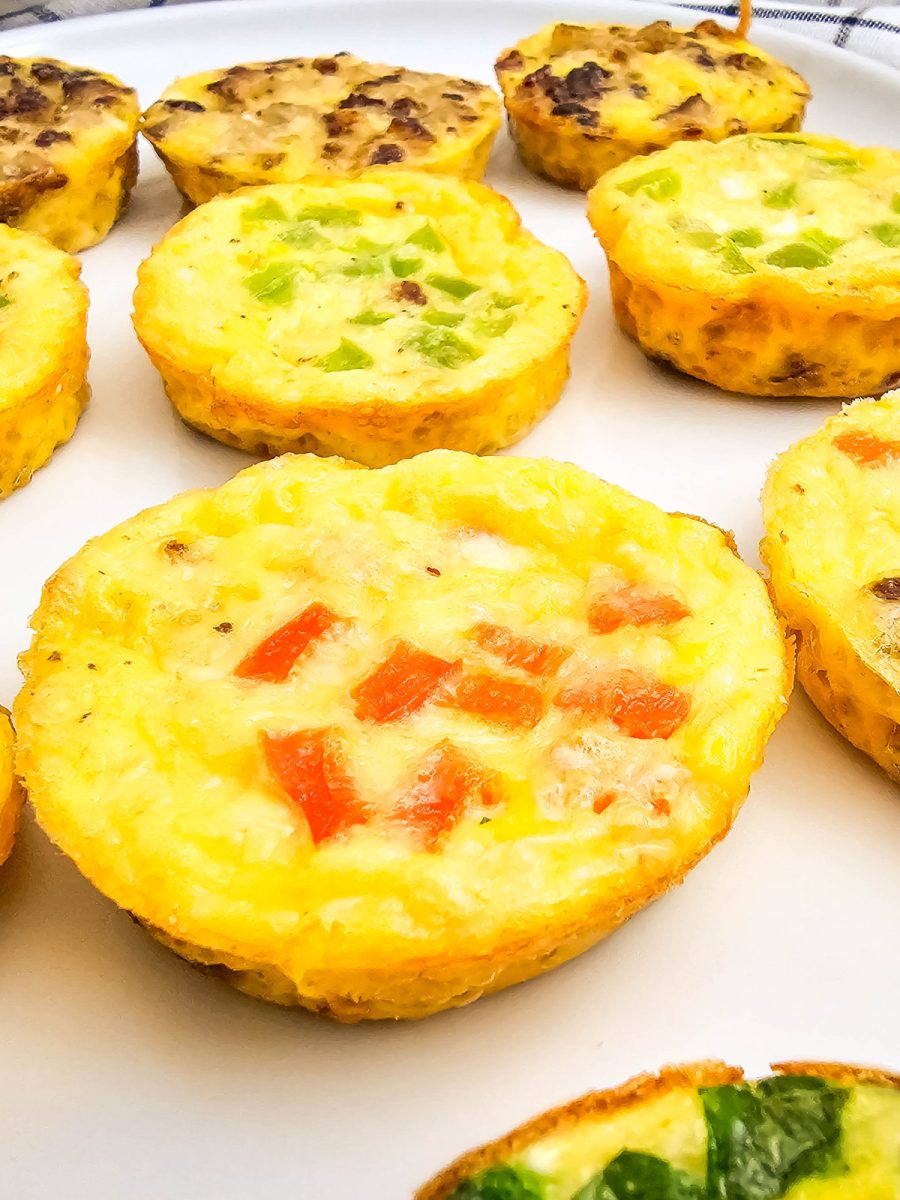 close up shot of veggies and meat omelets