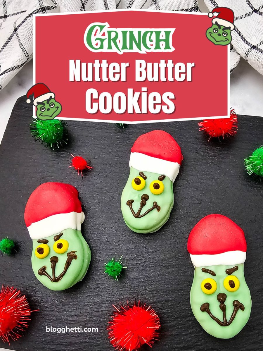 A pin image with a red and white text overlay reading "Grinch Nutter Butter Cookies" above three finished cookies on a black tray, with the website logo "blogghetti.com" at the bottom.