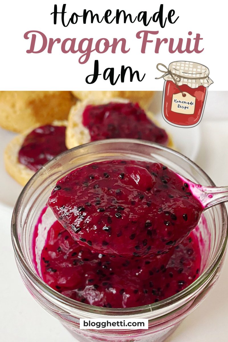 The background shows a soft-focus view of biscuits spread with bright pink jam. A small cartoon illustration of a jam jar with a "Homemade Recipe" tag is positioned on the right. A silver spoon holds a dripping scoop of the dark pink jam over a glass jar, highlighting the texture and black seeds.