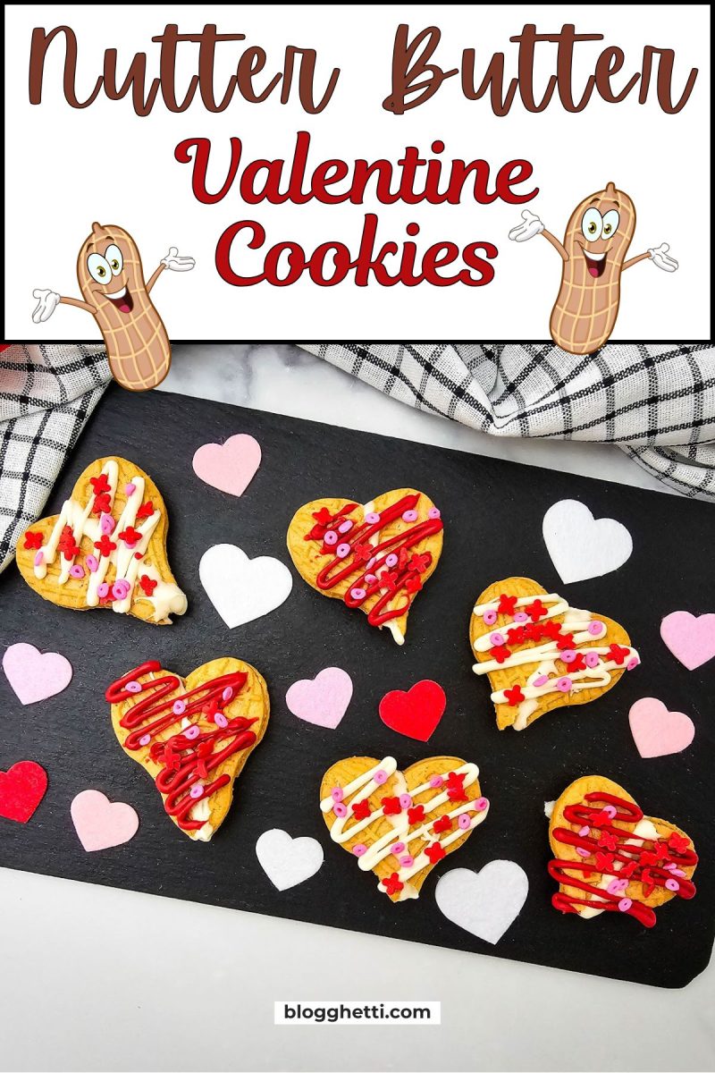 A festive digital graphic featuring six decorated peanut butter heart cookies on a black slate. The top of the image has a large banner that reads "Nutter Butter Valentine Cookies" flanked by two cheerful cartoon peanut characters with their arms outstretched.