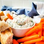 feature image for dip in bowl with bread pieces and carrots
