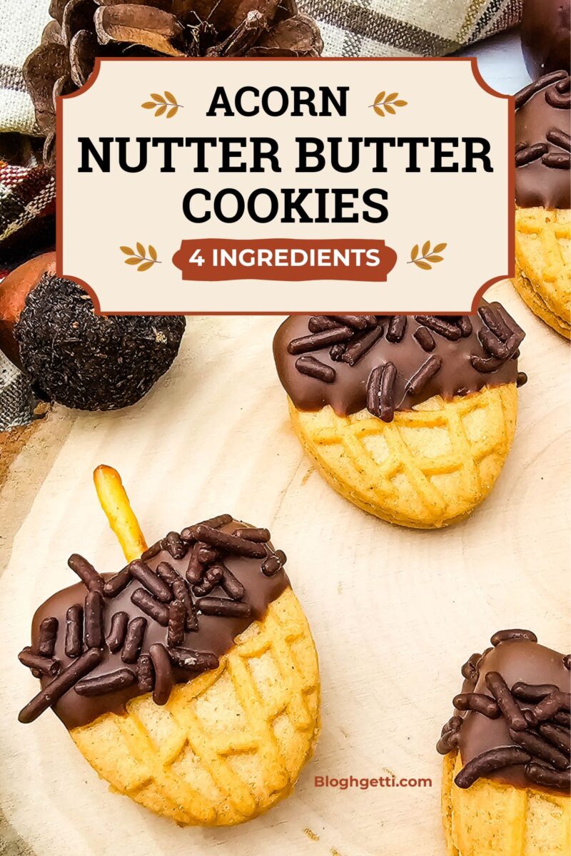 Close-up of chocolate-dipped Nutter Butter cookies decorated with chocolate sprinkles and pretzel stems. Text reads “Acorn Nutter Butter Cookies, 4 Ingredients.”