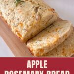 Sliced cheese and herb bread on a wooden cutting board. Text reads “Apple Rosemary Bread,” “With Sharp Cheddar,” and “Blogghetti.com.”