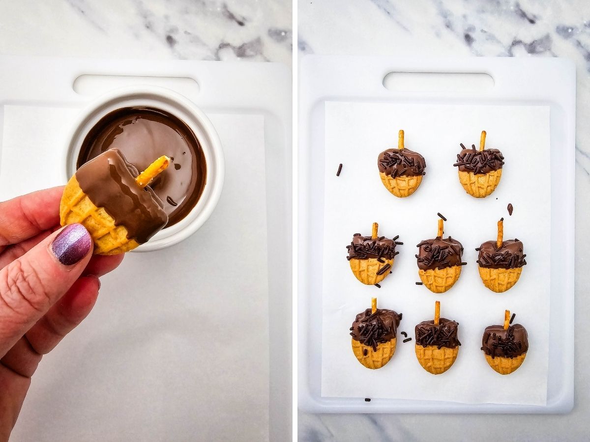 A chocolate-dipped Nutter Butter half with a pretzel stem beside eight finished cookies topped with chocolate sprinkles.