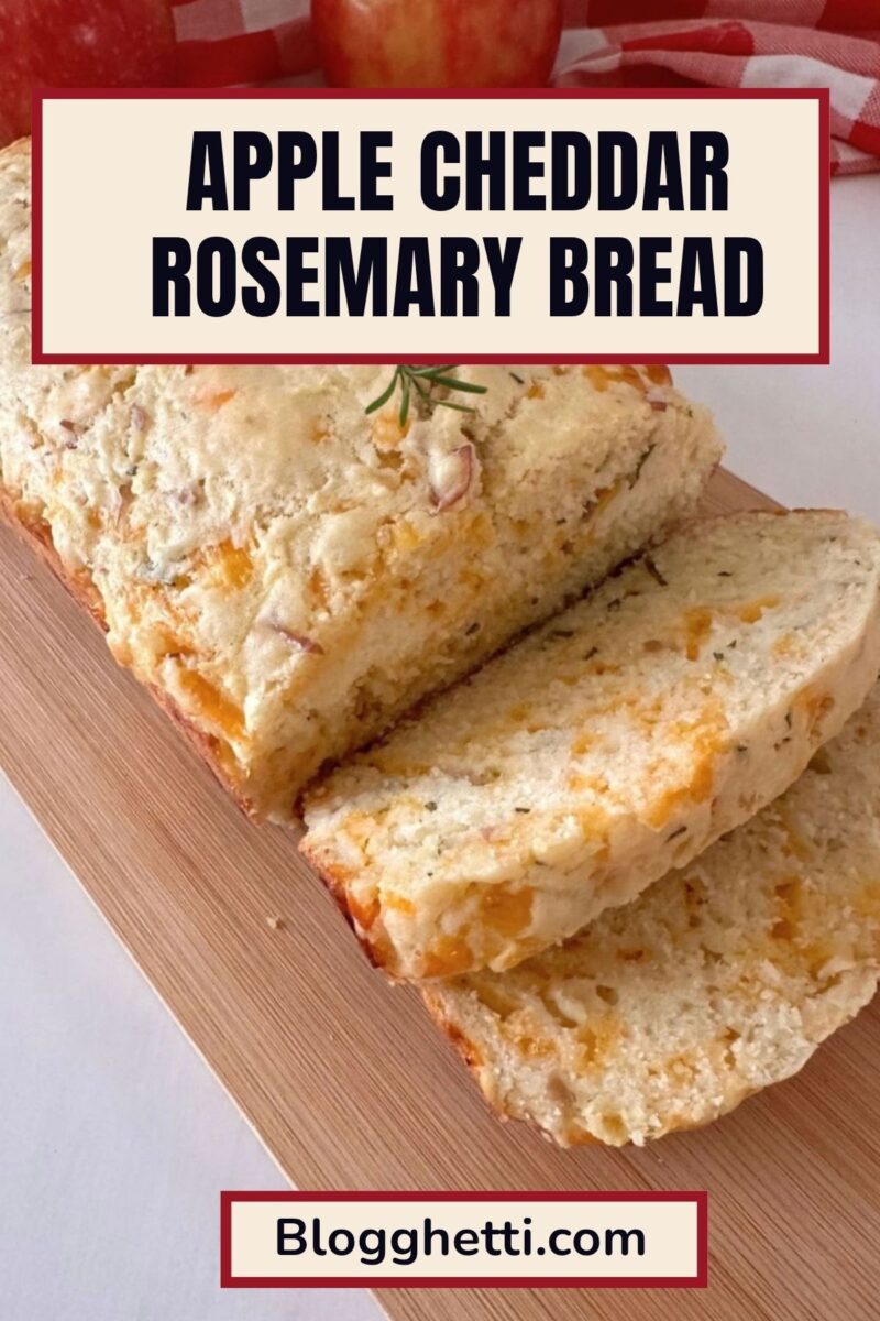 Sliced loaf on a wooden cutting board with apples and a red-and-white checked cloth. Text reads “Apple Cheddar Rosemary Bread” and “Blogghetti.com.”