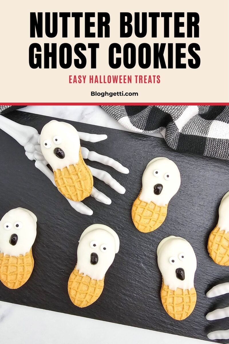 Pinterest graphic reading “Nutter Butter Ghost Cookies” and “Easy Halloween Treats” above six decorated peanut butter sandwich cookies on a black tray.