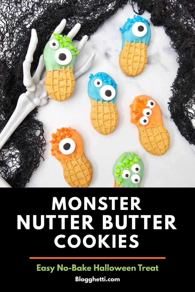 Monster Nutter Butter Cookies decorated with blue, green, and orange candy melts, matching sprinkles, and candy eyes are arranged with skeleton hands and black lace. Text reads, “Monster Nutter Butter Cookies: Easy No-Bake Halloween Treat.”